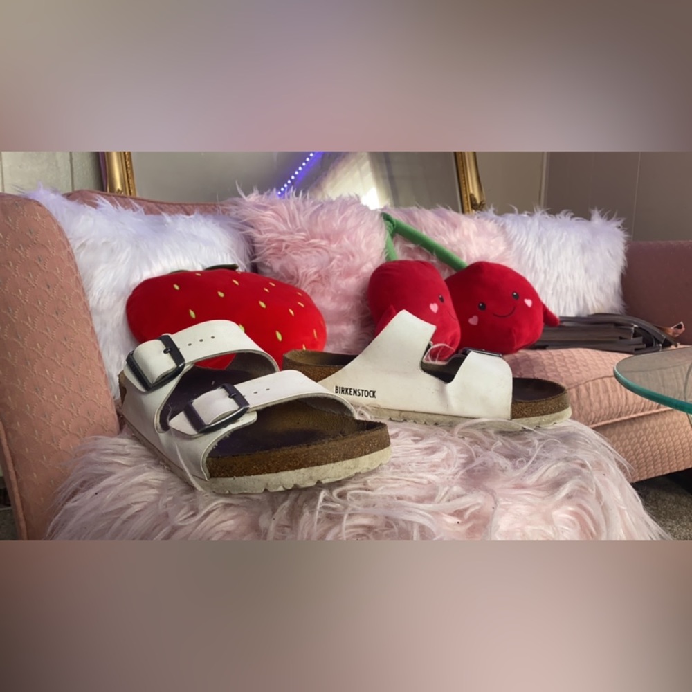 White used Birkenstocks , worn a lot but still put together